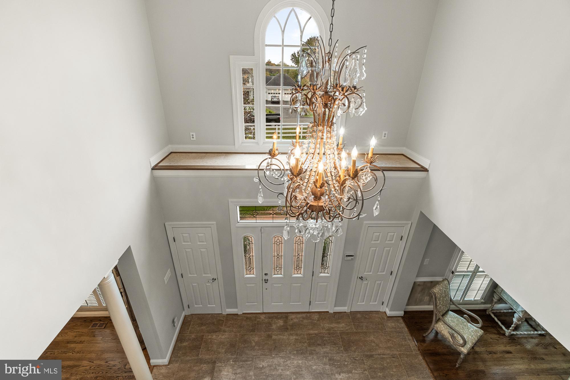 12649 High Meadow Road North Potomac, MD 20878 - Photo 46 of 79 Grand foyer with a BEAUTIFUL chandelier