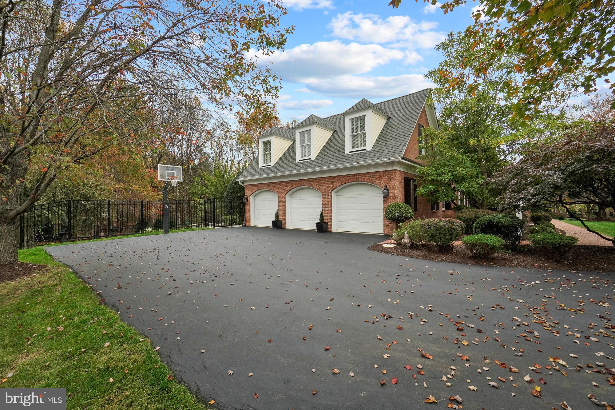 12649 High Meadow Road North Potomac, MD 20878 - Photo 6 of 79 Three car garage with plenty of parking area