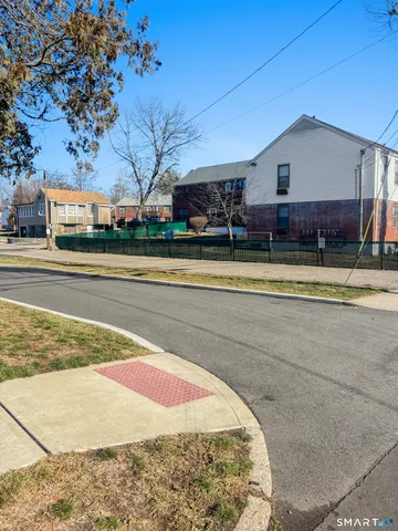 a view of a house with a swimming pool