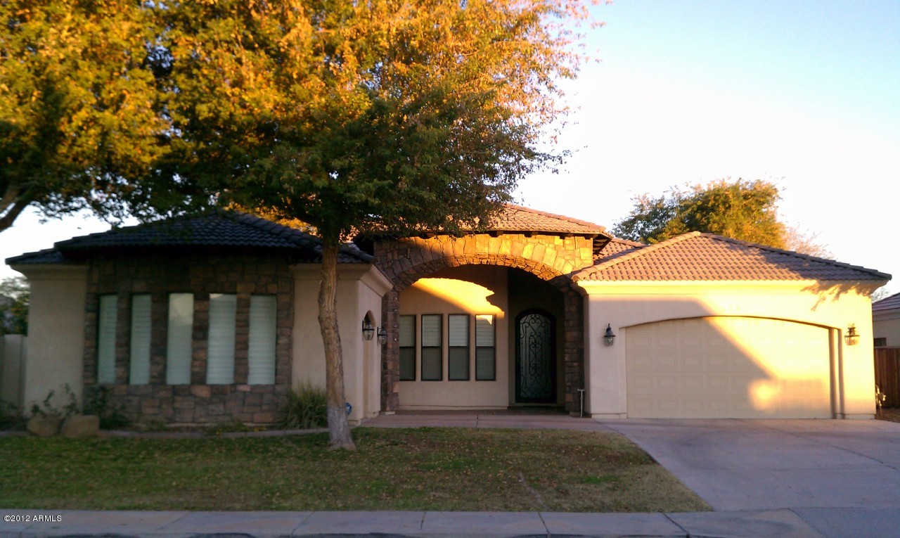435 South Neuman Way Chandler, AZ 85225 - Photo 1 of 28 a front view of a house with a yard