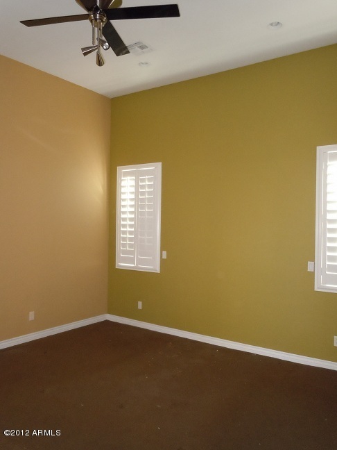 435 South Neuman Way Chandler, AZ 85225 - Photo 15 of 28 a view of a big room with windows and chandelier fan