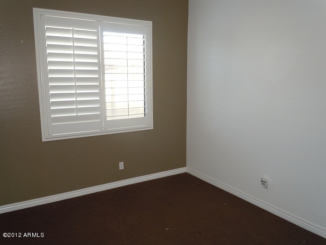 435 South Neuman Way Chandler, AZ 85225 - Photo 16 of 28 a view of a room with wooden floor and a window