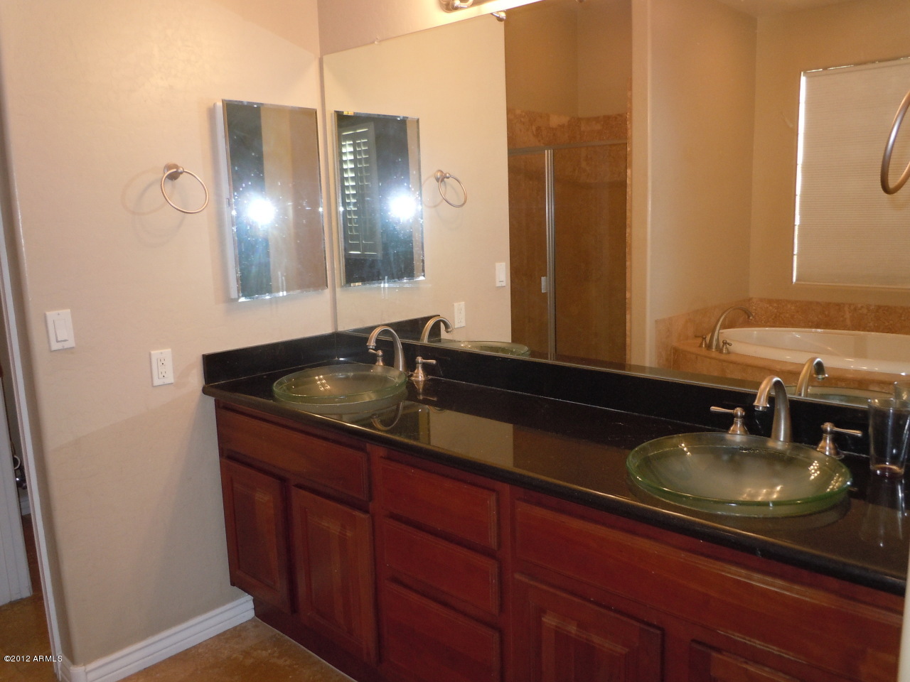 435 South Neuman Way Chandler, AZ 85225 - Photo 26 of 28 a bathroom with a sink and a mirror