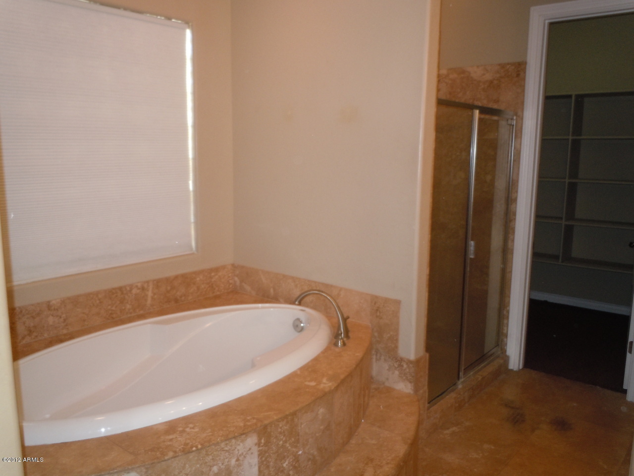 435 South Neuman Way Chandler, AZ 85225 - Photo 28 of 28 a white bath tub sitting in a bathroom