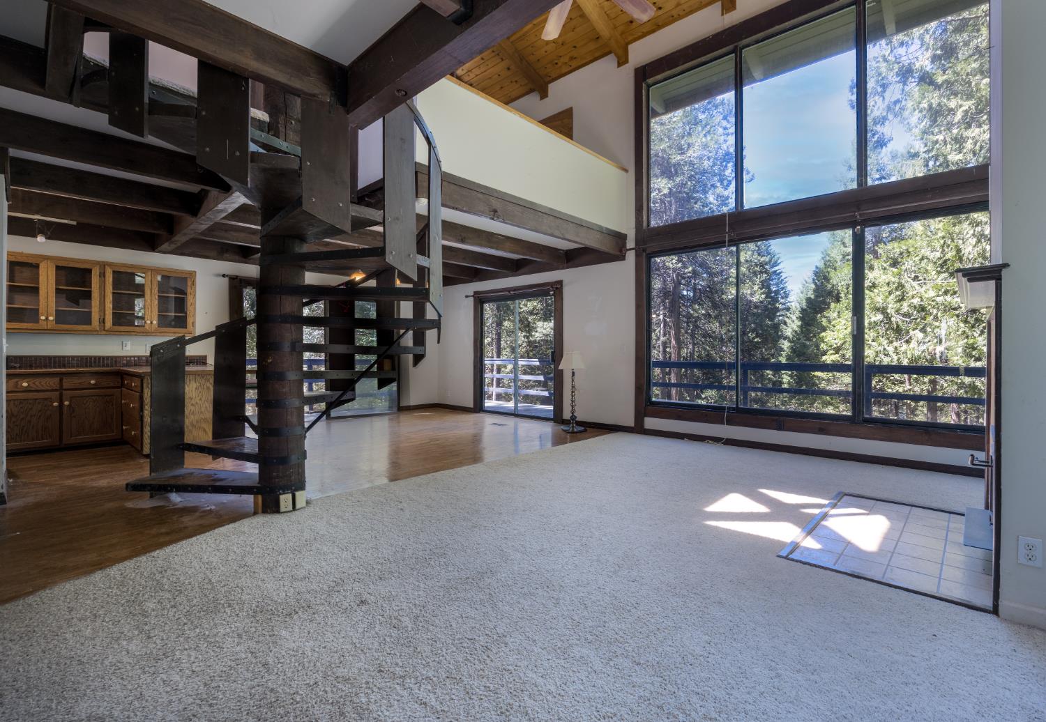 2070 King Of The Mountain Road Pollock Pines, CA 95726 - Photo 5 of 53 a view of an empty room with windows