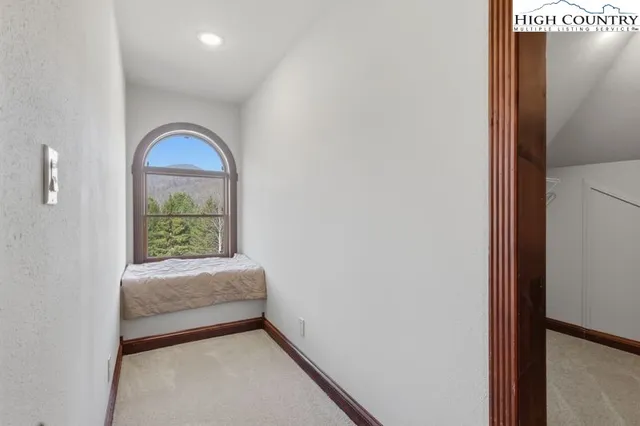 a view of livingroom with furniture and window