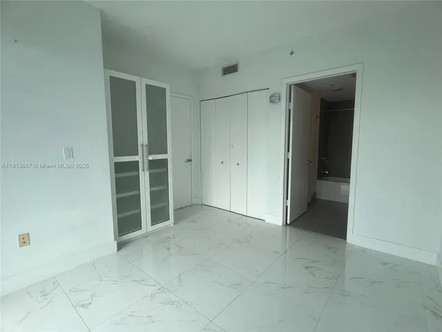 an empty room with closet