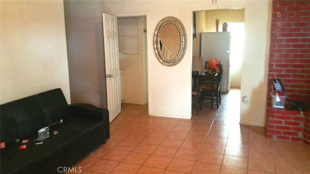 14650 Boyle Avenue Fontana, CA 92337 - Photo 10 of 15 a view of a entryway door with wooden floor