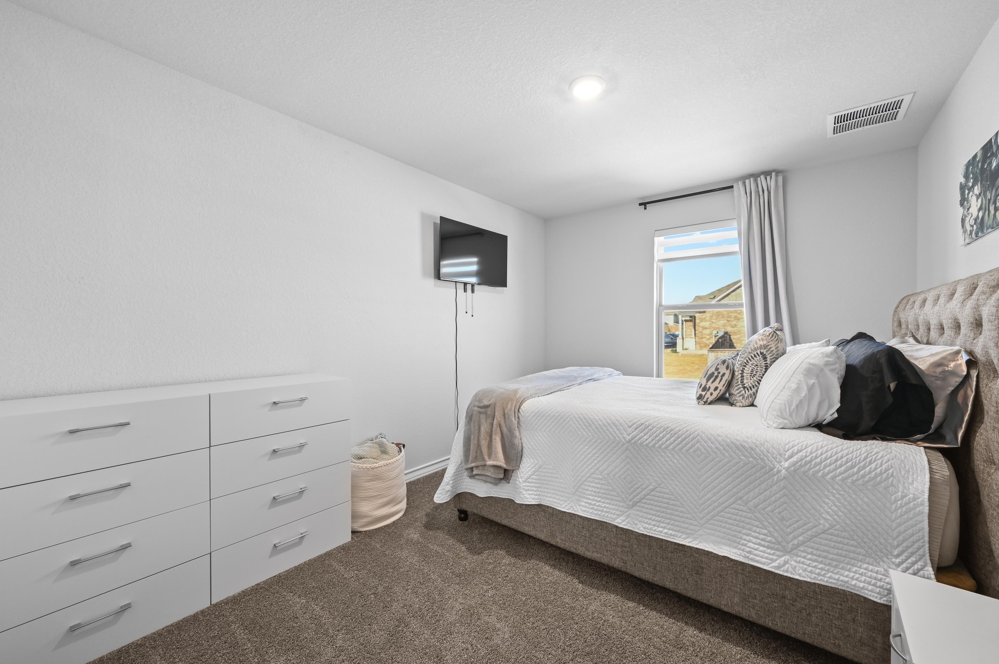 116 Small Seed Drive Buda, TX 78610 - Photo 21 of 40 Bedroom featuring dark carpet