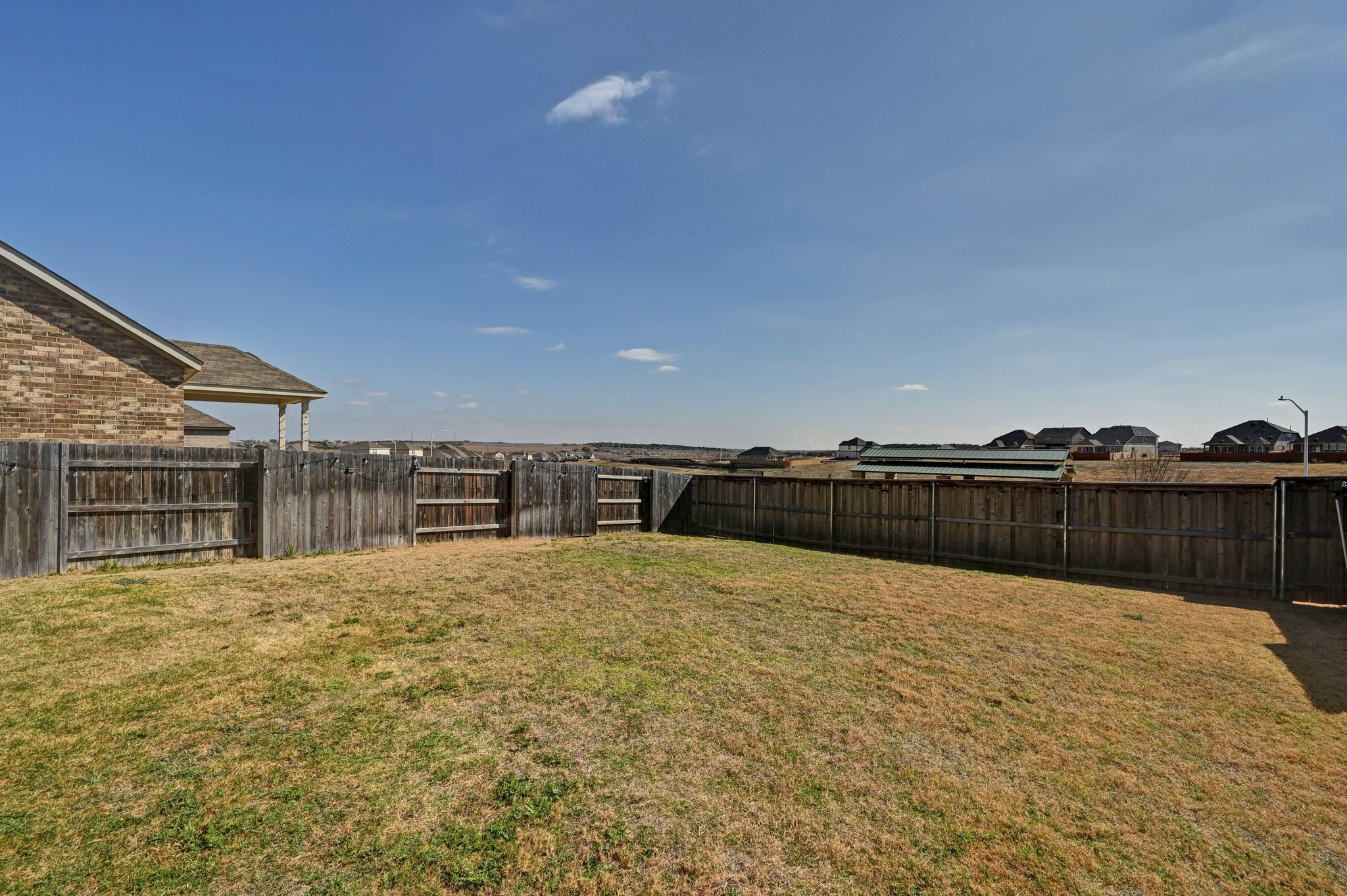116 Small Seed Drive Buda, TX 78610 - Photo 25 of 40 View of fenced backyard