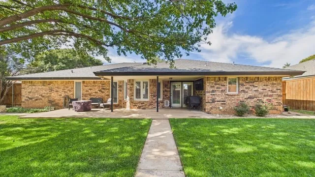 a view of a back yard of the house