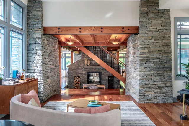 a view of swimming pool with outdoor seating