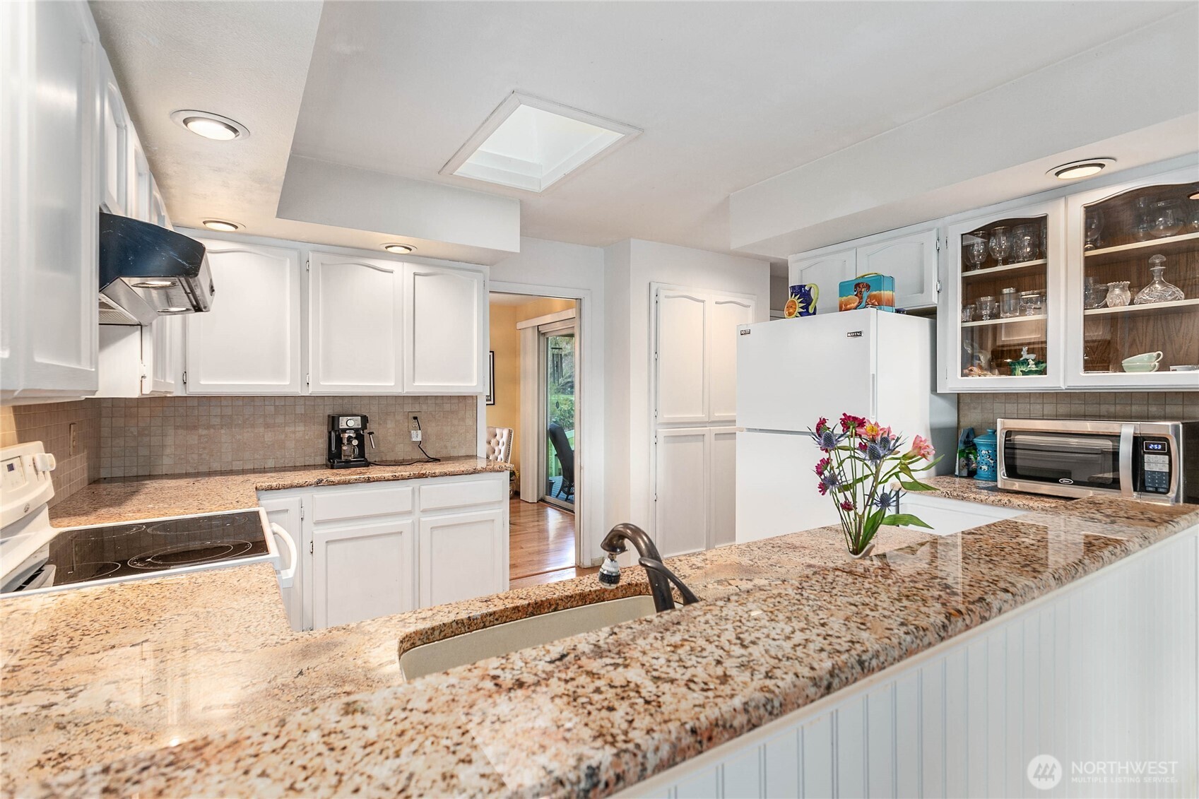 12544 Eagle Drive Burlington, WA 98233 - Photo 14 of 34 a kitchen with stainless steel appliances granite countertop sink stove and refrigerator