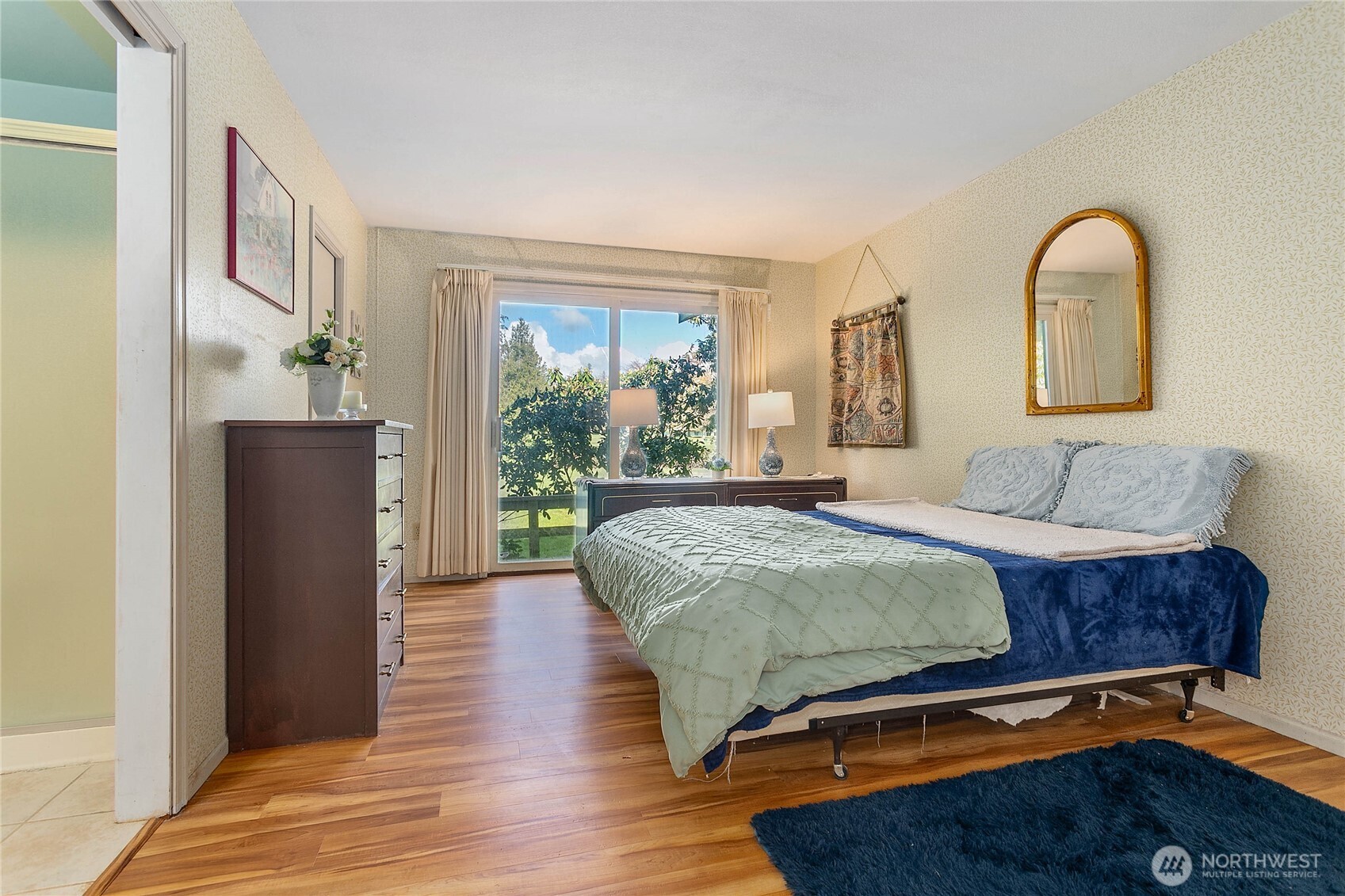 12544 Eagle Drive Burlington, WA 98233 - Photo 17 of 34 a bedroom with a bed and wooden floor