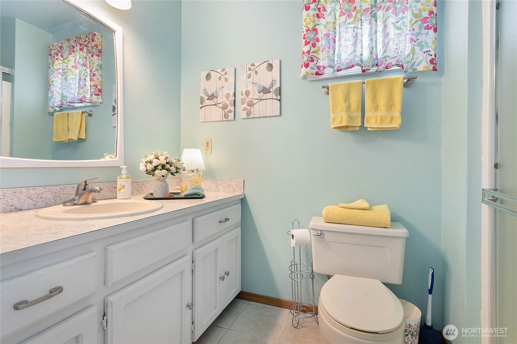 12544 Eagle Drive Burlington, WA 98233 - Photo 19 of 34 a bathroom with a granite countertop toilet sink and mirror