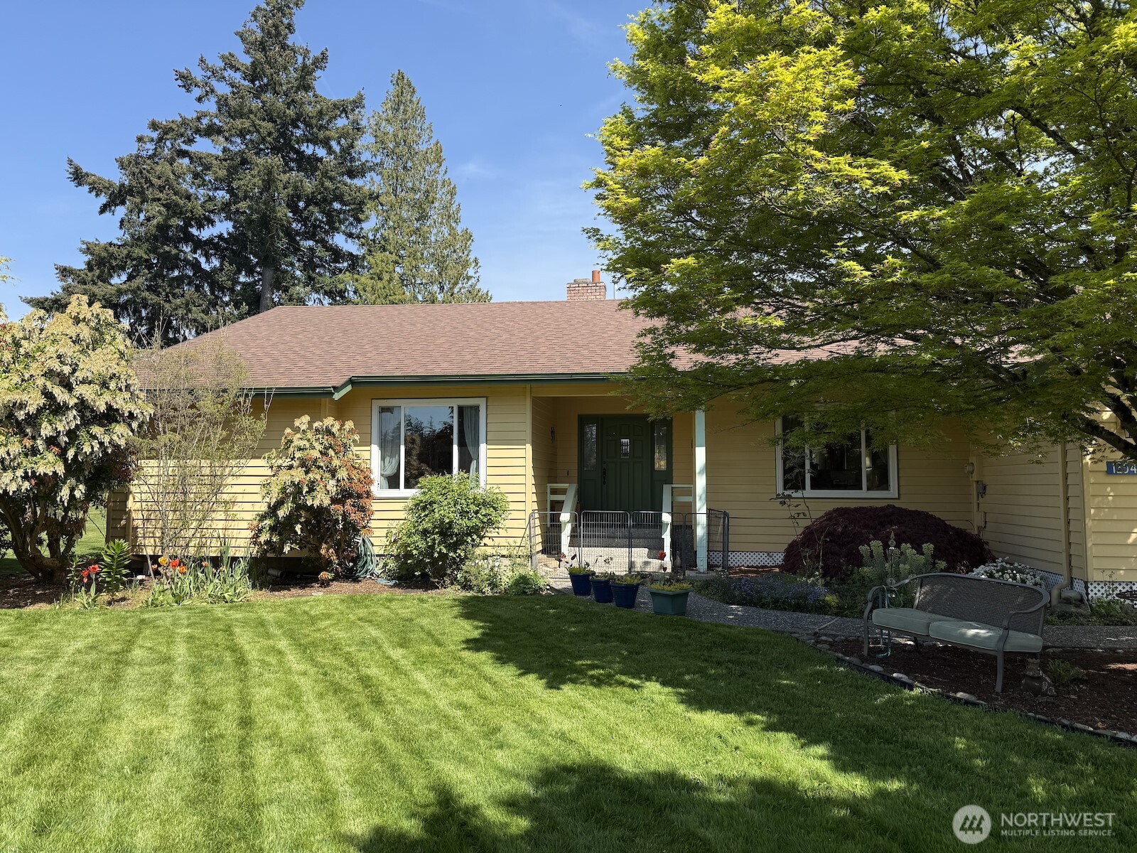 12544 Eagle Drive Burlington, WA 98233 - Photo 2 of 34 a front view of a house with a yard