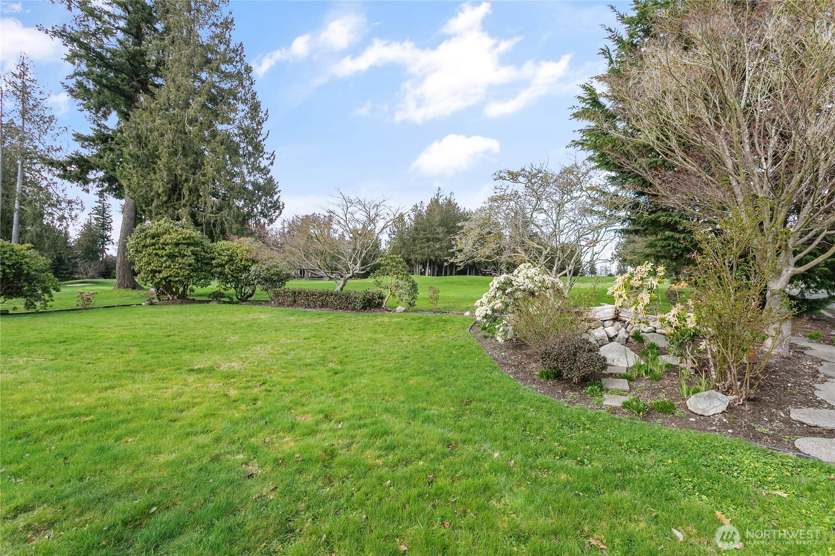 12544 Eagle Drive Burlington, WA 98233 - Photo 33 of 34 a view of a garden with a tree