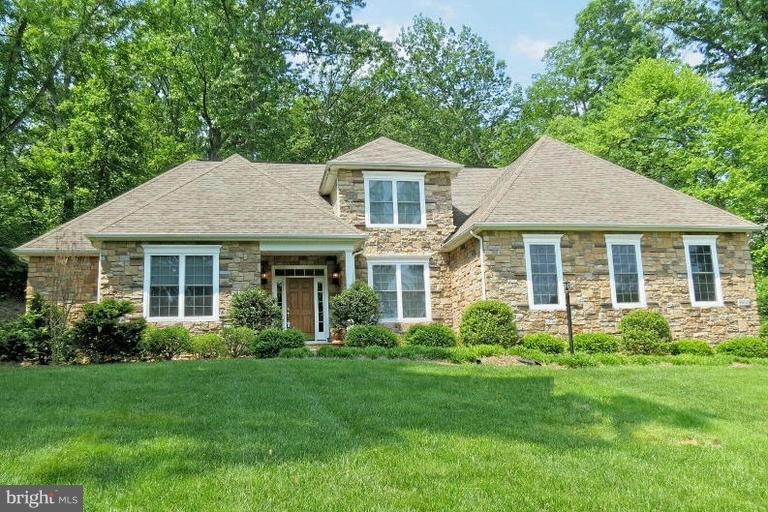 7650 Talbot Run Road Mount Airy, MD 21771 - Photo 1 of 15 a front view of a house with garden and porch