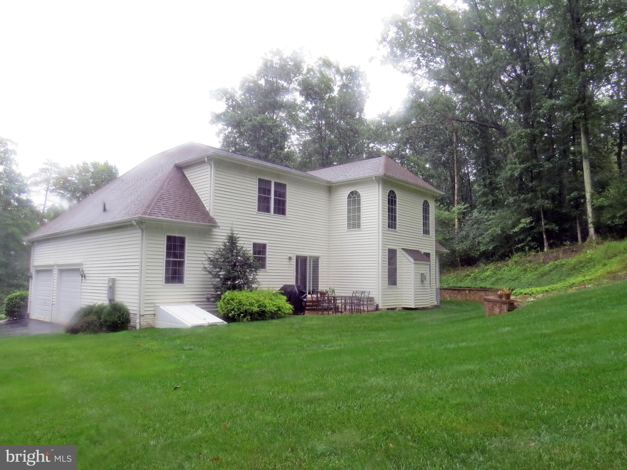 7650 Talbot Run Road Mount Airy, MD 21771 - Photo 15 of 15 a front view of house with yard and green space