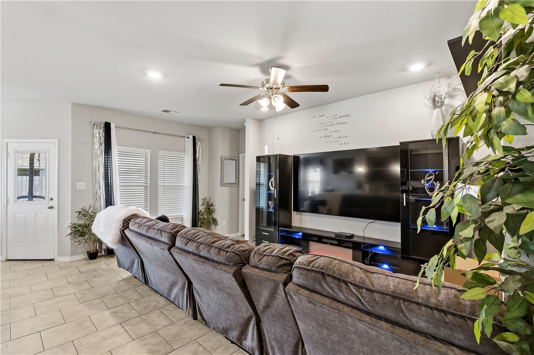 2009 Chief Street Bryan, TX 77807 - Photo 3 of 27 a living room with furniture and a flat screen tv