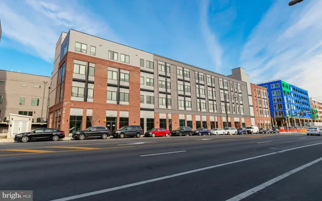a view of a building and a street