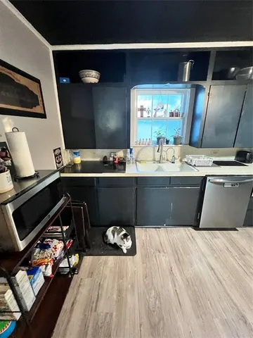 a room with a chair and mirror