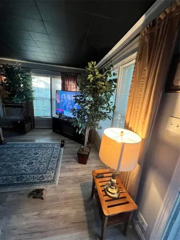 a backyard of a house with outdoor seating