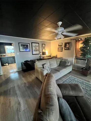 a living room with furniture and a couch