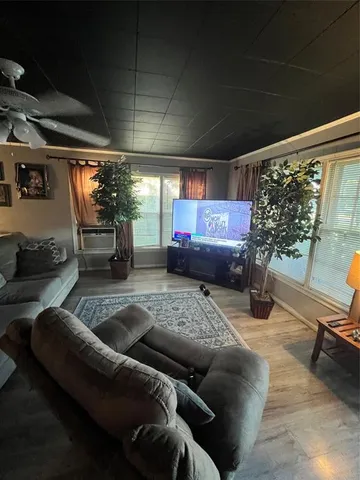 a living room with furniture and a couch