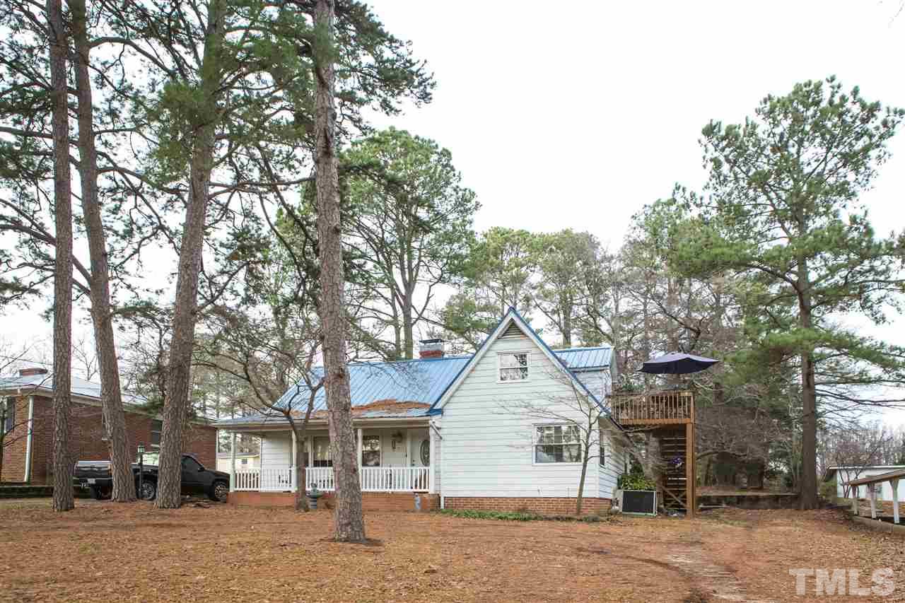 429 South Morgan Street Roxboro, NC 27573 - Photo 1 of 25 a front view of a house with a yard