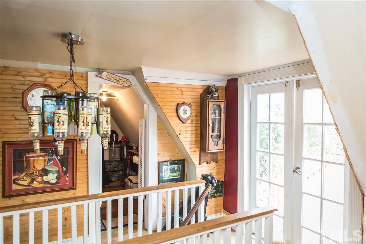 429 South Morgan Street Roxboro, NC 27573 - Photo 22 of 25 a view of a hallway with windows