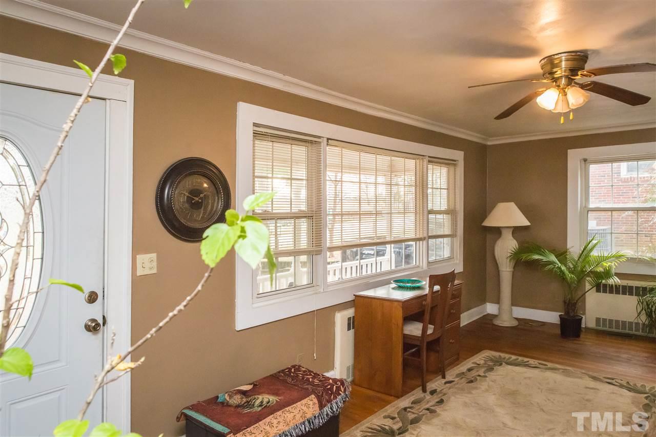 429 South Morgan Street Roxboro, NC 27573 - Photo 7 of 25 a living room with furniture and a window