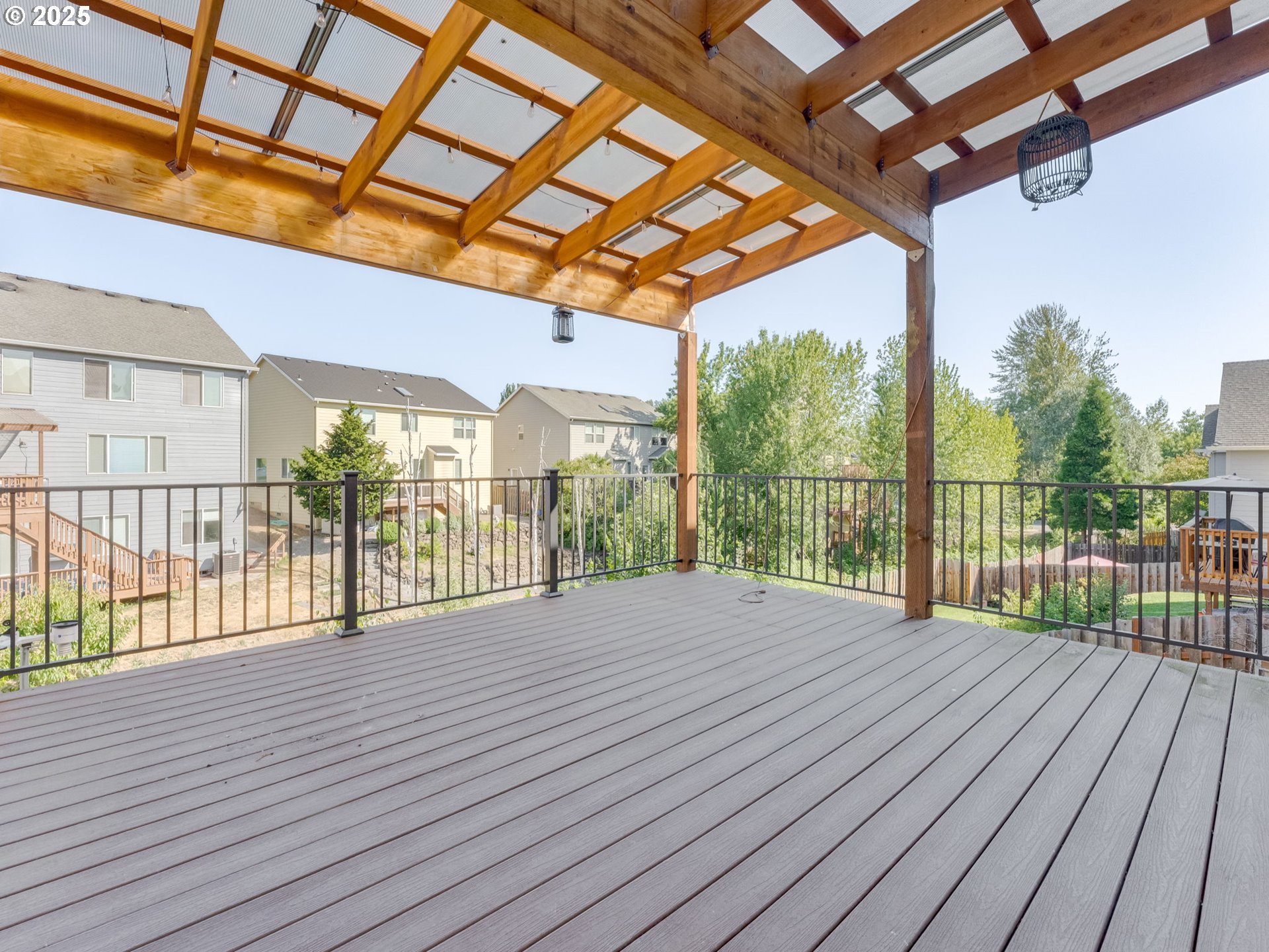 5641 Southeast Chase Loop Gresham, OR 97080 - Photo 12 of 39 a view of porch with wooden floor