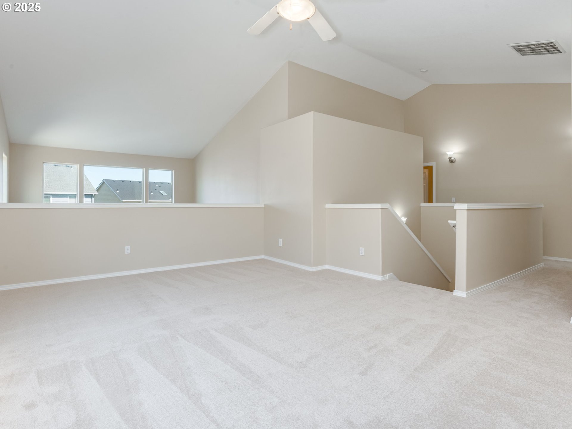 5641 Southeast Chase Loop Gresham, OR 97080 - Photo 19 of 39 an empty room with a empty space and windows