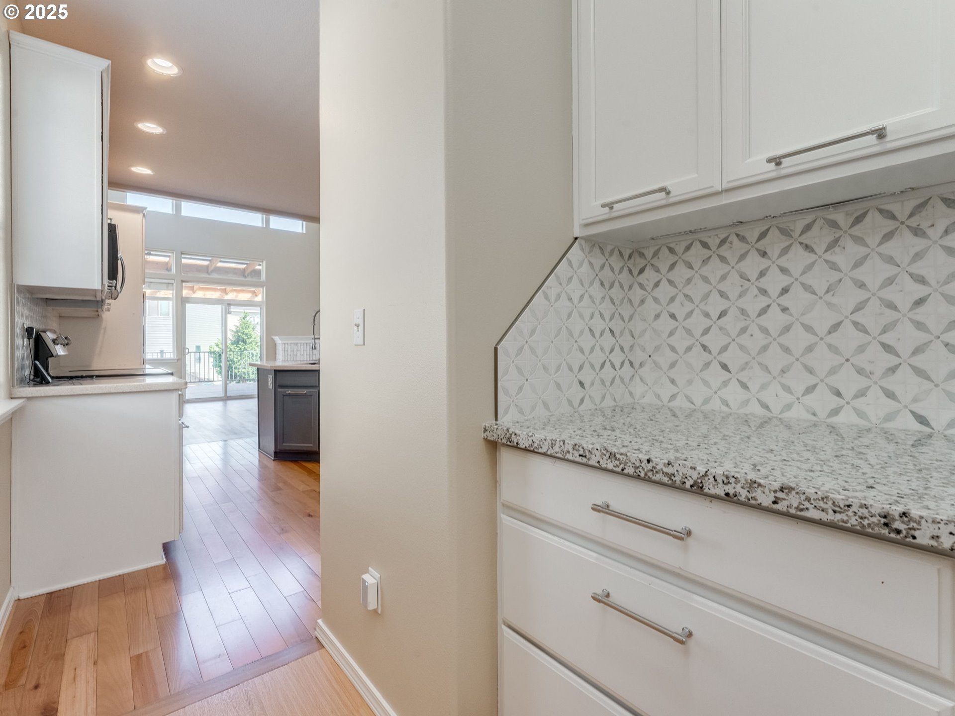 5641 Southeast Chase Loop Gresham, OR 97080 - Photo 8 of 39 a view of kitchen island with wooden floor