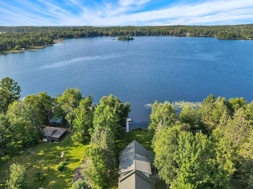 8222 South Dowling Road West Superior, WI 54880 - Photo 53 of 56 Aerial view of a heavily wooded area and a nearby body of water