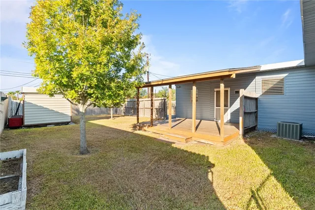 a view of swimming pool with a patio