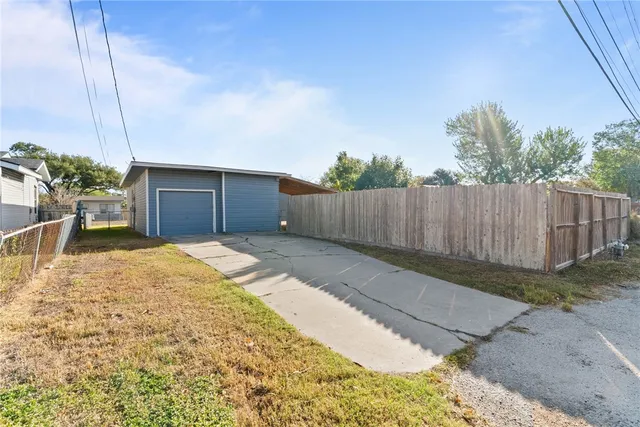 a house view with a backyard space