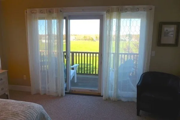 a view of bedroom with window