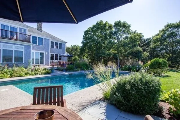 a view of a swimming pool from a balcony