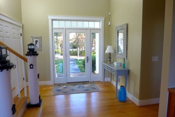99 Pond Road West Tisbury, MA 02568 - Photo 8 of 39 a view of empty room with wooden floor and fan