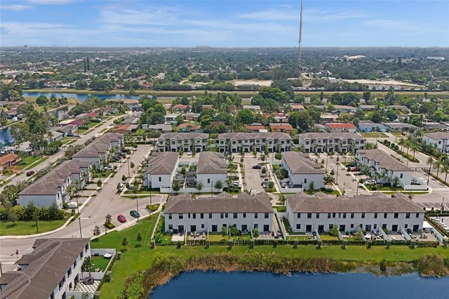 an aerial view of a city with lots of residential buildings