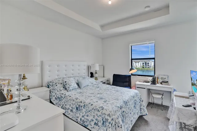 a bedroom with a bed and furniture