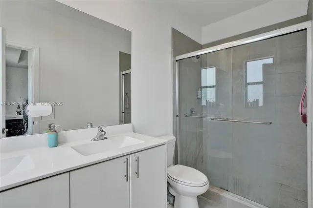 a view of a swimming pool with outdoor seating