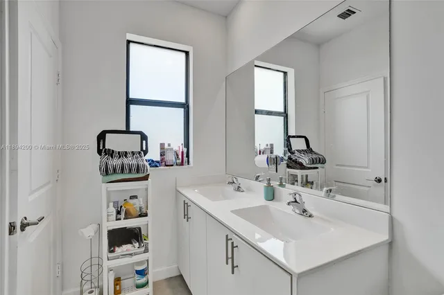 a swimming pool with outdoor seating and yard