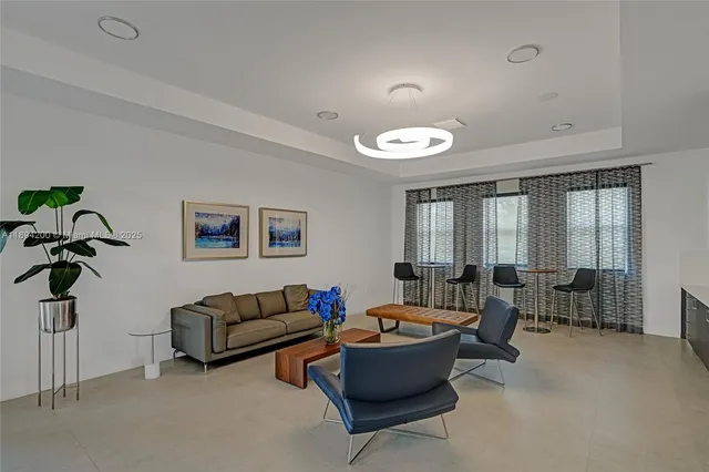 a room with gym equipment and a large window