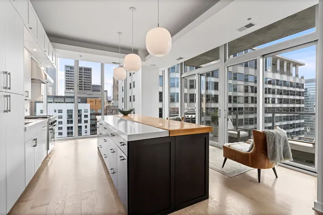 a kitchen with a stove and a sink