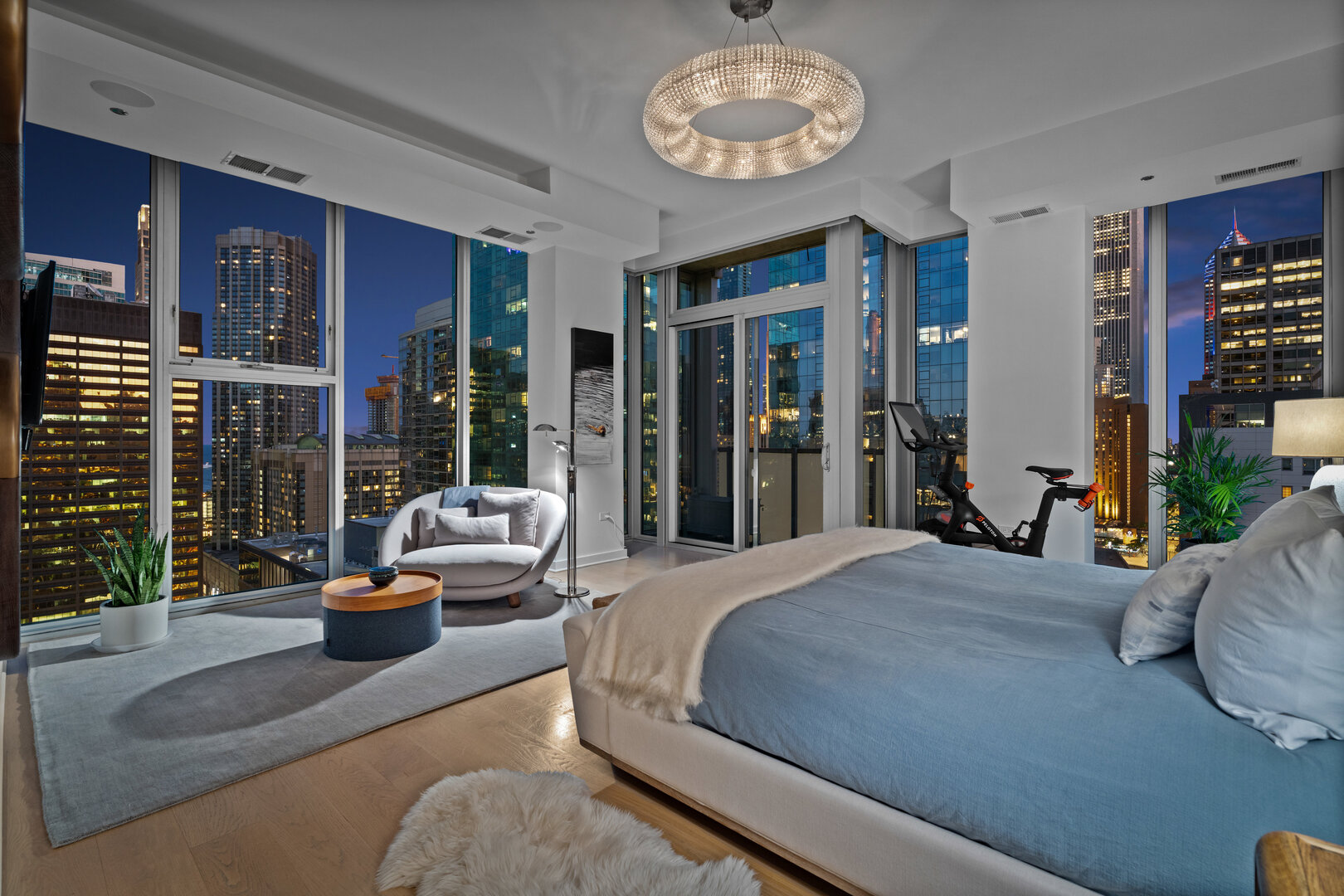 550 North St Clair Street, Unit 2502 Chicago, IL 60611 - Photo 27 of 53 a bedroom with a large bed and a large window