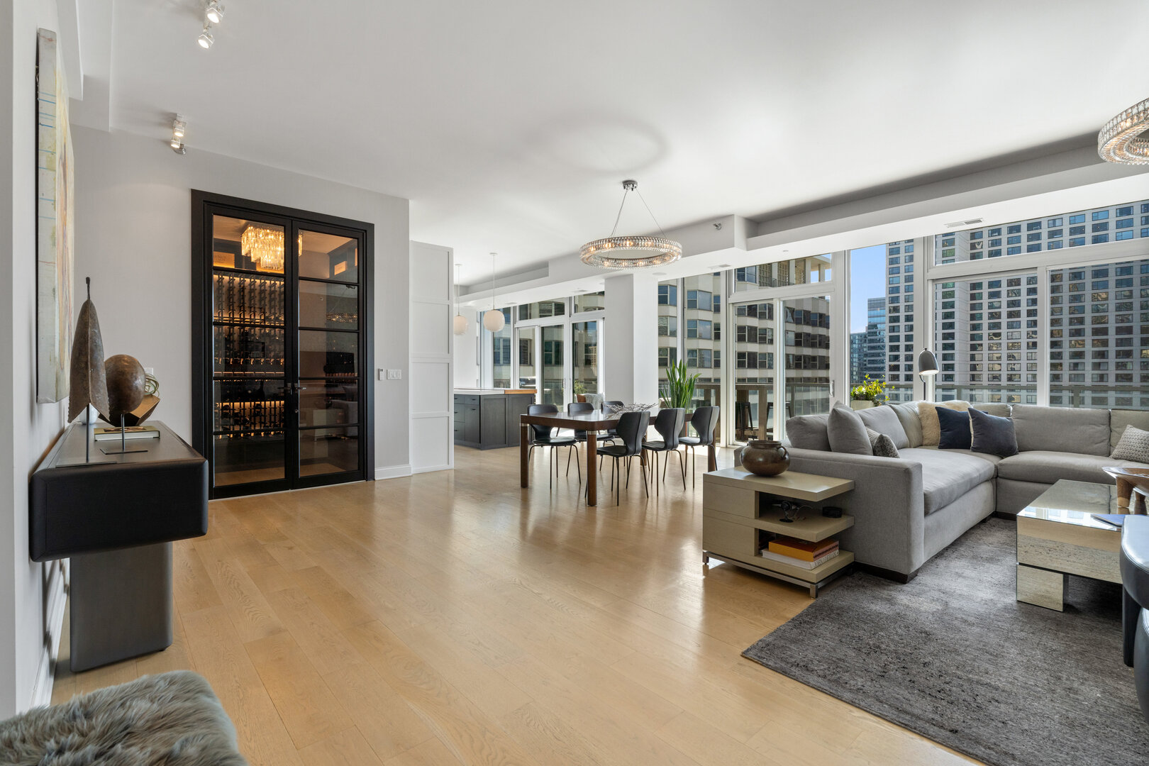 550 North St Clair Street, Unit 2502 Chicago, IL 60611 - Photo 3 of 53 a living room with furniture and a table