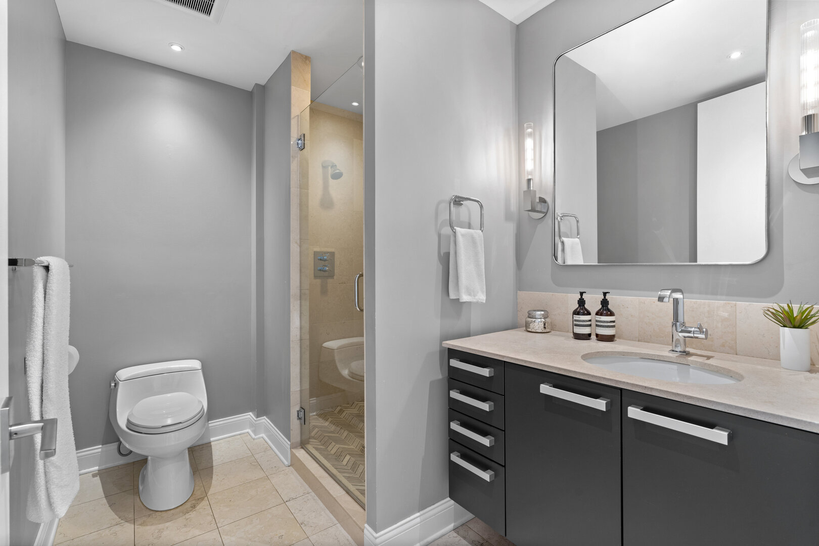 550 North St Clair Street, Unit 2502 Chicago, IL 60611 - Photo 38 of 53 a bathroom with a sink toilet and shower